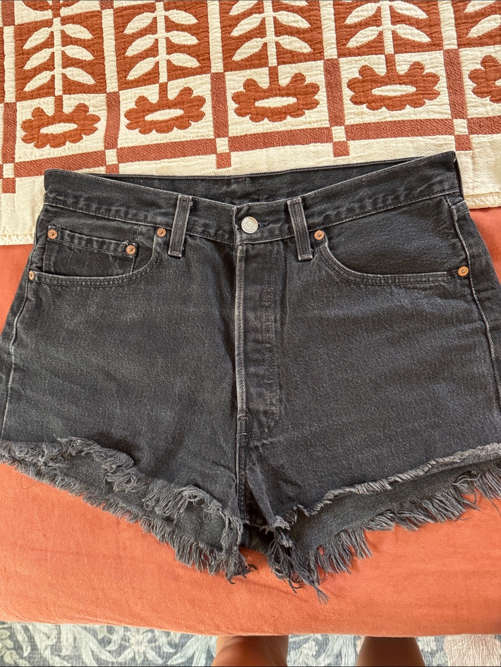 Vintage Levi’s High-Rise Black Denim Shorts with Frayed Hem